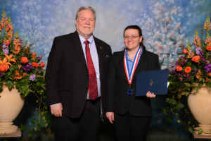 Submitted photo Falon Lammers and Dr. Jim Richardson, president of WVC.