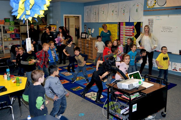 Gary DeVon/staff photos  Students in Cyley Moser’s Kindergarten class work off some extra energy to The Wiggles during Leadership Day. 