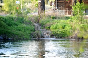 Tonasket Creek finds an outlet near the Cherry Street Bridge in Oroville. The creek followed a course that mostly skirted the western and southern boundaries of Bud Clark Fields and then along the east side of Chesaw Road before dumping into the Okanogan River.