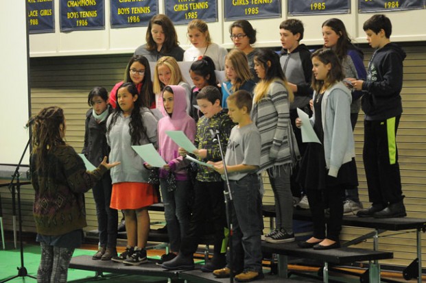 The Sixth Grade Chorus performs "America the Beautiful."