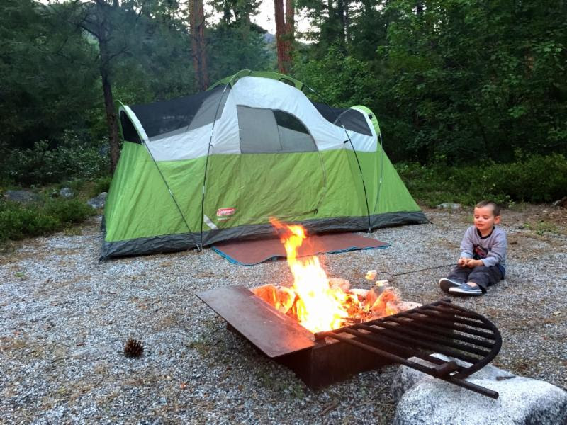 USDA Forest Service/Holly Krake A young camper enjoys marshmallows and a campfire while camping at Lake Creek Campground near Entiat, WA. Starting Monday September 17, 2018, campfires will be allowed in designated campgrounds such as Lake Creek. USDA Forest Service by Holly Krake