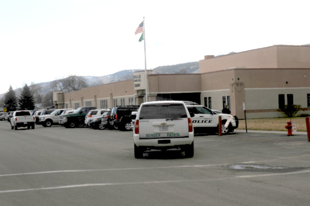 Gary DeVon/staff photo U.S. Border Patrol Agents assist the Oroville Police during a lockdown at the Oroville School District on Tuesday,k March 26.
