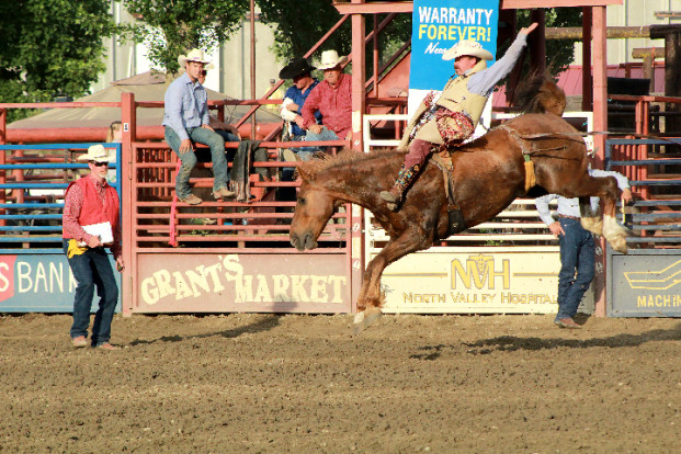 Laura Knowlton/staff photos Keifer Larson on Broncomadic and Chrisoph Muigg on Tombstone tied for first place in the bareback riding, each taking home a prize of $658.35.