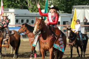 Queen Trinity Dejong during the flag ceremony at the Founders Day Rodeo on Saturday night.