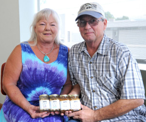 Gary DeVon/staff photo Sandi Palmer and Rob Smith the couple behind Pop’s Pickled Garlic are getting ready to attend this year’s Garlic Festival at History Park.
