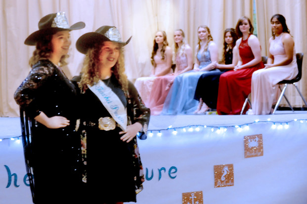 Visiting royalty, Miss Tonasket Julie Dellinger and Princess Madison Miller are introduced at selection night, while the May Festival Royalty await their chance to show why they wish to become Oroville May Festival Queen.