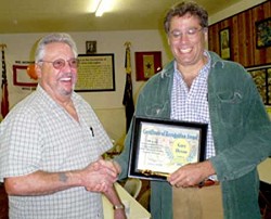 Oroville Mayor Chuck Spieth awards Okanogan Valley Gazette-Tribune managing editor, Gary DeVon, a certificate of achievement and Oroville’s ‘Key to the City’ Sept. 27 to commemorate DeVon’s 20 years of G-T newspaper journalism.