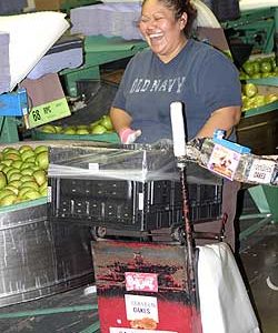 CRACK UP - Consulo Padilla is normally a fast apple packer for Gold Digger Apples, but teasing by her fellow workers as she posed for a picture led to a temporary break in the action as she got a case of the giggles. Padilla was packing for Gold Digger at