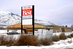 The sign for the new Oroville Building Supply, across from its old location south of Oroville on Highway 97, recently went up. The business, comprised of a new, larger storefront and separate building to store wood and other building materials, is nearing