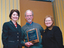 Submitted photoRetired North Valley Family Medical physician Walter Henze (center) received an Outstanding Rural Health Practitioner 2008 Award March 21 in Spokane. Representative Cathy McMorris-Rodgers (left) and state Sec
