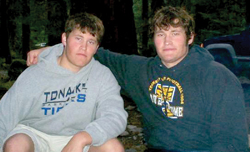 Photo from Brady Freeman’s MySpace account            Brady, left, and twin brother Boone Freeman during a camping trip.