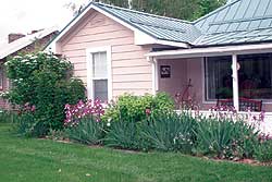 Photo by Gary DeVonCut ‘n’ Edge of Tonasket can add flowers and landscaping to people’s homes. LynAlan and Susan Koehn own the new business and recently used their skills on this Oroville area home.