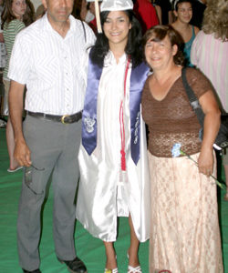 Photo by Gary DeVonJudy Roel receives congratulations from her parents Bob and Vera after last Saturday’s Commencement Ceremonies for the OHS Class of 2008.