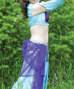 Submitted photo    Belly dance instructor Christy Cuellar-Wentz performs a solo routine in this picture taken recently by her husband. Cuellar-Wentz currently offers dance classes at the Community Cultural Cente