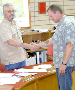 Photo by Gary DeVon    Oroville Mayor Chuck Spieth shakes hands with newly appointed Oroville Police Chief Clay Warnstaff. Warnstaff has been serving as interim police chief during Randy Wheatâ€™s absence.