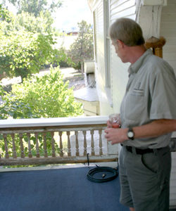 Photo by Gary DeVon&amp;nbsp;&amp;nbsp;&amp;nbsp; Bill Nicholson on the balcony of his 100 year-old house on 16th Ave in Oroville. Nicholson has been refurbishing his home for 21 years. He and his wife Jessica hosted peopl