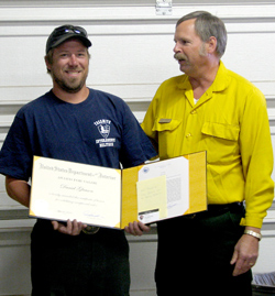 USFS photo Dan Gleason (left) and Mark Morris, Ranger for the Tonasket Ranger District. Gleason recently received the Medal of Valor for helping to save the life of a climber at Yosemite.