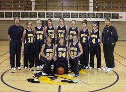 The 2008-2009 Oroville Lady Hornet Varsity Basketball Team is: (front row, L-R) Lacy Johnson, Chrissy Sadler, Emily Graham (back row) Coach Rick Mead, Austi Quick, Rachel Peters, Catie Arrigoni, Alex Egerton, Taylor Sarmiento, Kayla McKinney, Jayden Smith