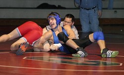 Tonasket senior Trey Jensen wrestling against Chelan on Thursday, Jan. 29. Jensen won his match at 135 pounds by a pin. Photo by Les Bowen