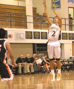 Marcus Kinman, a senior for the Hornets, had 16 points against the Bridgeport Mustangs, including four three-pointers. Photos by Gary DeVon