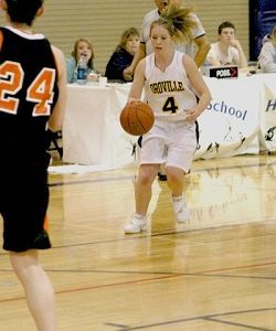 The Lady Hornet's Kayla McKinney brings the ball down court against the Entiat Tigers. McKinney, a 5'5" junior places in the guard position and is one of the Hornet's best ball handlers.