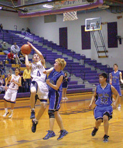 Oroville senior Luke Rowton goes up strong against SoapLake at Districts. The Hornet scored 11 points i