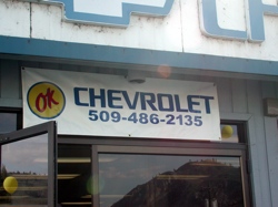 A sign on the front of Hedlund Chevrolet which changed ownership on Friday, May 1. Tony Booth now owns OK Chevrolet in Tonasket. Photos by Emily Hanson