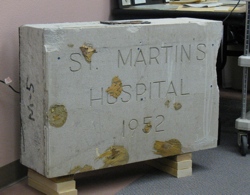 899a The original cornerstone of St. Martin's Hospital, sealed on Sept. 17, 1952. The construction crew at North Valley Hospital discovered the cornerstone in the wall of the lobby and within it they found a time capsule when they hit it with a jackhammer. Th