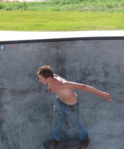 Photo by Emily HansonMichael Scott, 18, riding his board through the bowl in the B3 Skate Park in Tonasket on Friday, July 10.