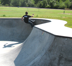 Mo Brown, 17, riding his board up the side of the bowl, getting ready to turn at the top.Photo by Emily Hanson