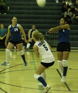 Tonasket senior Maribella Alvarez hits the ball over teammate junior Brooke Ray’s head during Tonasket’s home game against Lake Roosevelt on Tuesday, Oct. 13 while senior April Webber waits on the side to get to the ball if it didn’t go over the net