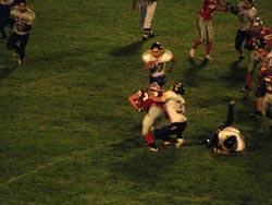 Tonasket junior linebacker Dustin Silverthorn takes down a Cascade running back as sophomore linebacker John Stedtfeld rushes to assist in the tackle during Tonasket’s away game against Cascade on Friday, Sept. 25.Photo by Emily Hanson