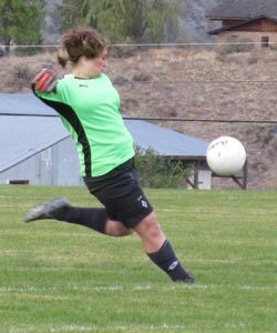 Tonasket goalie junior Stefanie Brunell kicking the ball away from the Tonasket goal and back into Okanogan territory during Tonasket’s home game against Okanogan on Tuesday, Sept. 29.Photo by Emily Hanson