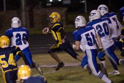 Hornet Nicky Perez went three yards to score a touchdown, followed up with a two point conversion with Perez again going three yards for the two points, giving Oroville a 21-18 lead.  The score was made possible after Oroville linebacker Matt Studard blit