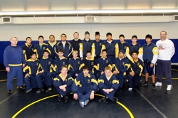 The 2009/2010 Oroville Hornet Wrestling team is (front, L-R) Mike Lynch, Eric Ruiz, Caleb Whiteaker, (middle row) Enrique Martinez, Davis Castillo, Alex Kelly, Brody Naysnerski, Ivan Rodriquez, Alex Alvarez, Gil Ildelfonso, Leo Pelgado, (back row) Coach C