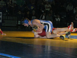 Tonasket junior Brandon Hudson rolling Lake Roosevelt senior Nathan Loch over for the pin during Tonasket’s home match against the Raiders on Thursday, Jan. 14. Photo by Emily Hanson