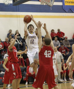 Tonasket senior Wade DeTillian flies toward the hoop to make a shot against Cascade during Tonasket’s home game on Saturday, Feb. 6. Photo by Terry Mills