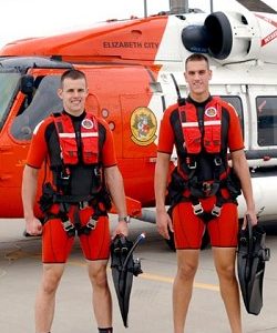 Darren Hicks (right) and a fellow Coast Guard Rescue Swimmer. File photo