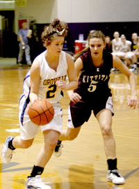 Lady Hornet Alex Egerton brings down the ball against the Kittitas Lady Coyotes in a loser-out game in the District playoffs. Photo by Terry Mills