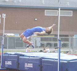 Tonasket sophomore John Stedtfeld bends over the bar in the high jump, clearing it, during the Tonasket Invitational track meet on Friday, April 16. Stedtfeld came in fifth place with a jump of 18-00.00. Photo by Emily Hanson
