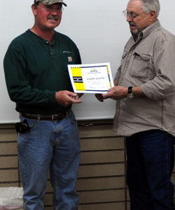 Oroville Mayor Chuck Spieth presents Mark Smith from USKH with a Certificate of Commendation for his quick action in administering CPR to a member of the paving crew working on Oroville’s Main Street Pedestrian Project. Spieth made the presentation at t