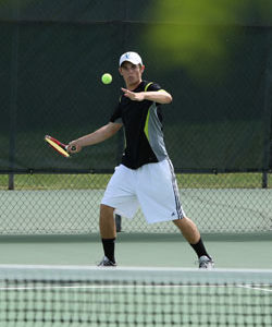 Tonasket junior Brett Hendrick prepares to hit the ball back to his opponent during the State Tennis Tournament in Yakima on Friday, May 28. Hendrick won his first match against Sully Blake of St. George’s 6-0, 6-0, lost his second match against Daniel