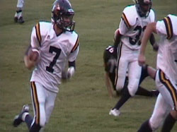 Oroville Hornet quarterback Preston Iverson returns the football 72 yards for a touchdown on the Republic Tiger’s opening kickoff in an 8-man game last Friday evening on the Tiger’s home field. The game was called in the Hornet’s favor after the fir