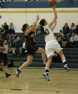 Tonasket senior Shelby Olma makes a lay-up shot against Bridgeport during the Lady Tigers’ home game on Tuesday, Dec. 7. Photo by Emily Hanson