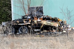 Not much remains of the fifth-wheel camper trailer in which Wayne Cumbo perished last Saturday in Oroville at his father’s property on the corner of Chesaw and Sawtells roads. Photo by Gary DeVon