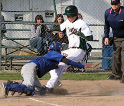 Tonasket catcher senior David Goyette gets the out at home plate against the Chelan Goats in Chelan on Tuesday, April 19. Photo by Carrie Draeger