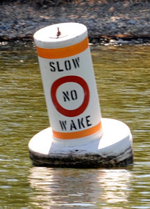 Buoys mark the channel where the No Wake Zone begins between Osoyoos Lake Veterans Memorial Park and Zosel Dam downstream. The slower speed helps to protect wildlife which are abundant in the area, as well as preventing shoreline erosion. Photos by Gary D