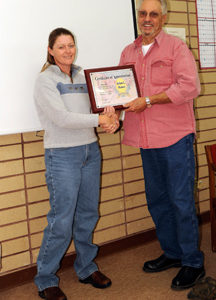 JoAnn Denney receives a plaque for her 20 years of service to the City of Oroville. Mayor Chuck Spieth made the presentation at the Tuesday, Oct. 4 meeting of the city council. Denney works at city hall and is the secretary and Chief Examiner for the Orov