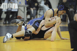 The Tigers' Collin Aitcheson had his way in the 120 pound title bout at Thursday's NOHI tournament, winning by a 16-0 technical fall.