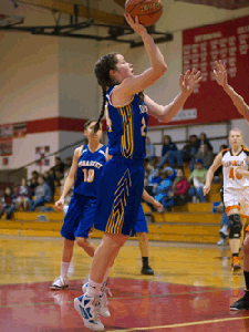 Photos by Brent Baker - Baylie Tyus goes up for two of her 17 points during Tonasket's overtime loss to Republic.